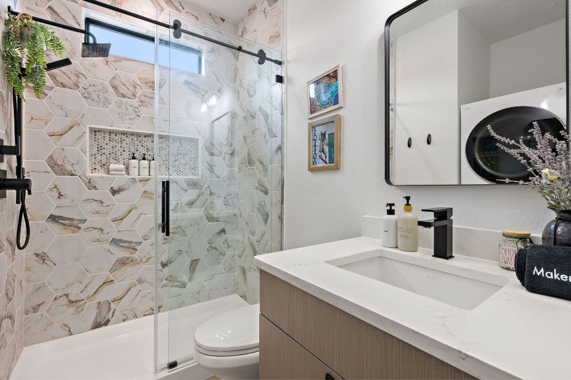 11 Sacramento Boerne, TX 78006 - Photo 30 of 40 Bathroom featuring a shower stall and vanity