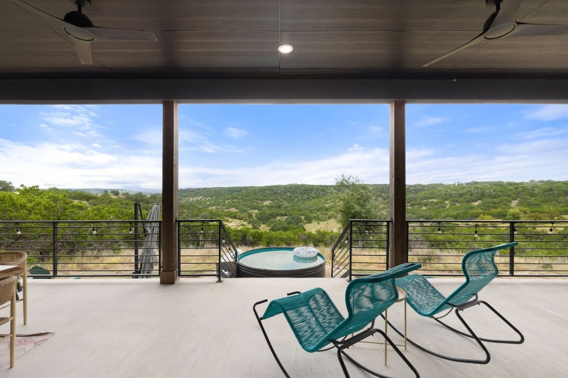 11 Sacramento Boerne, TX 78006 - Photo 10 of 40 Sunroom featuring a forest view and healthy amount of natural light