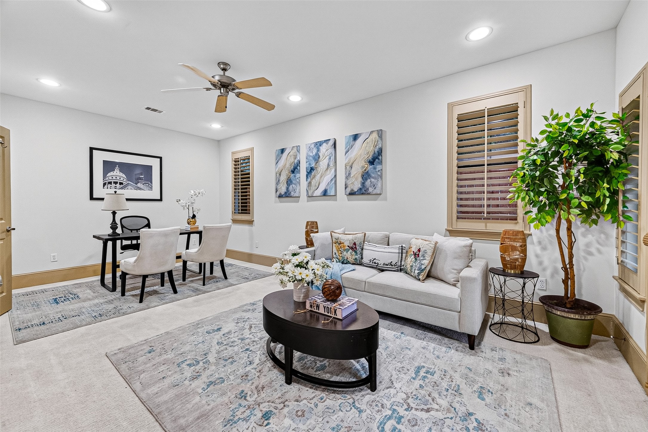 2034 Colquitt Street, Unit A Houston, TX 77098 - Photo 9 of 41 Large first floor ensuite bedroom with plenty of space for an office desk and couch for a perfect relaxation space.