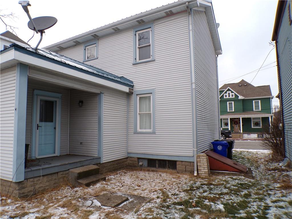 1026 Washington Avenue Monaca, PA 15061 - Photo 15 of 16 a front view of a house with a yard