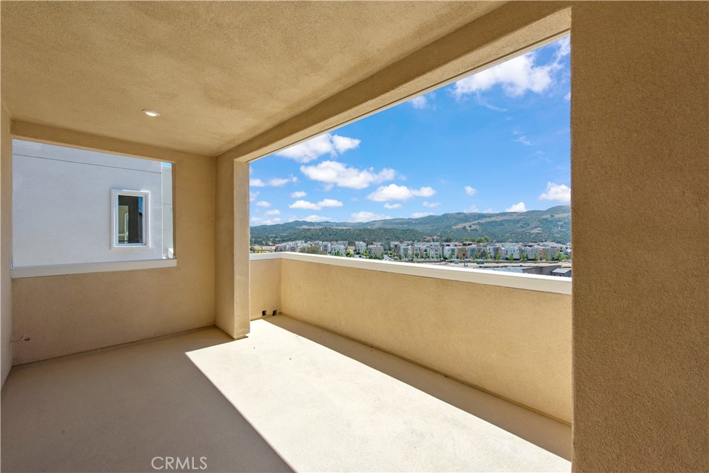 211 Ruby Road Rancho Mission Viejo, CA 92694 - Photo 21 of 41 a view of a room with a large window
