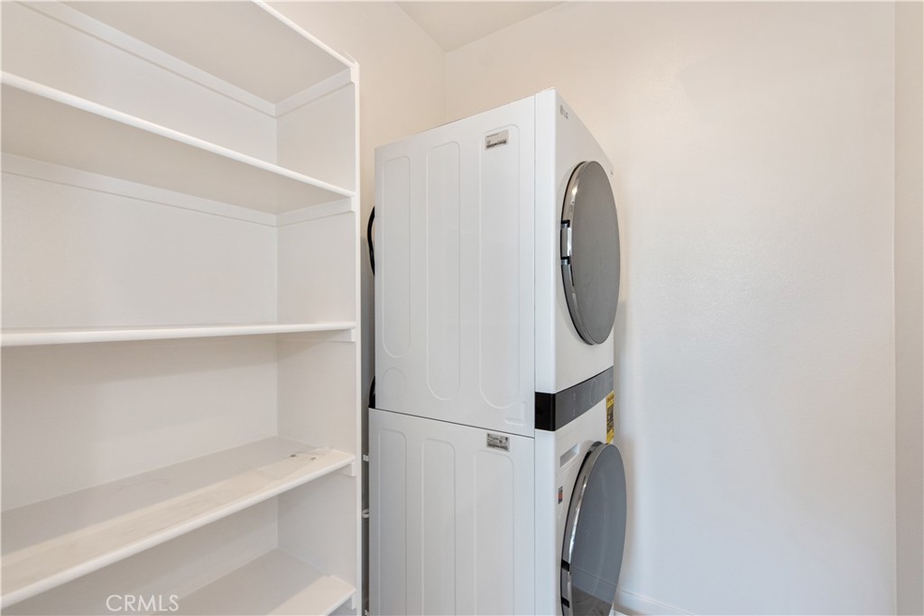 211 Ruby Road Rancho Mission Viejo, CA 92694 - Photo 26 of 41 a utility room with dryer and washer