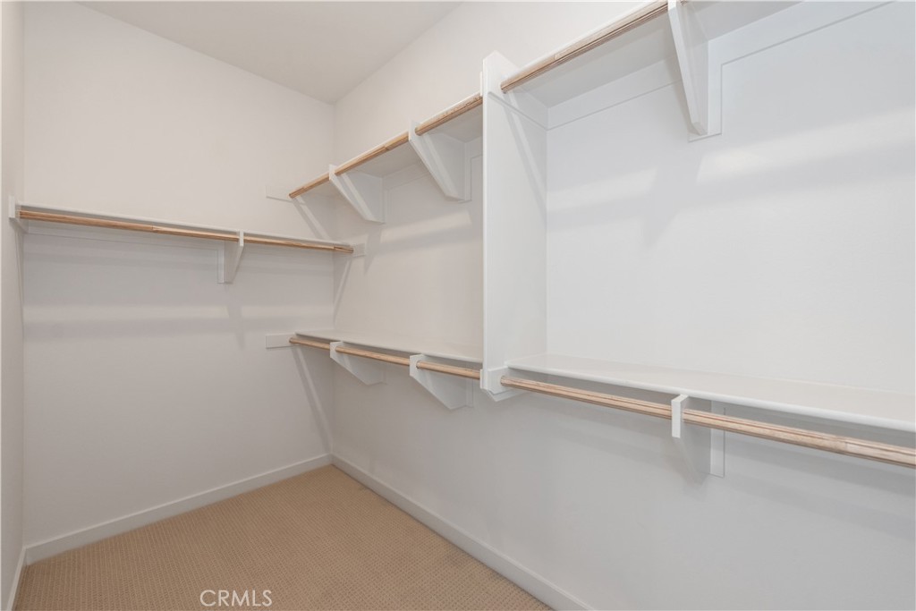211 Ruby Road Rancho Mission Viejo, CA 92694 - Photo 29 of 41 a view of an empty walk in closet