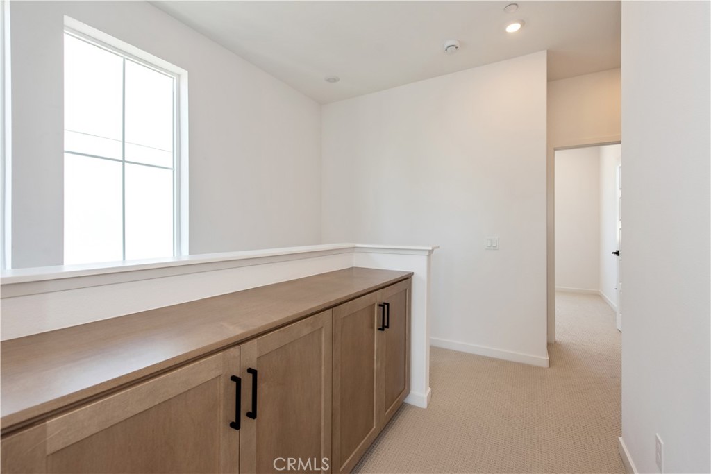 211 Ruby Road Rancho Mission Viejo, CA 92694 - Photo 32 of 41 a view of cabinets with wooden floor