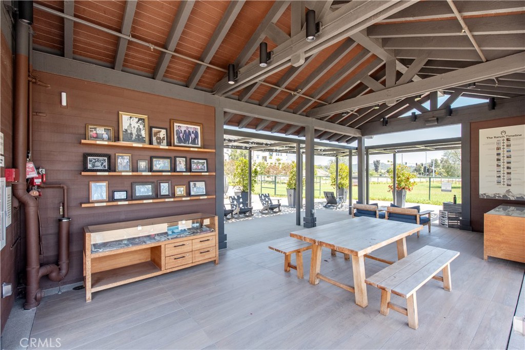 211 Ruby Road Rancho Mission Viejo, CA 92694 - Photo 36 of 41 a living room with furniture and a wooden floor