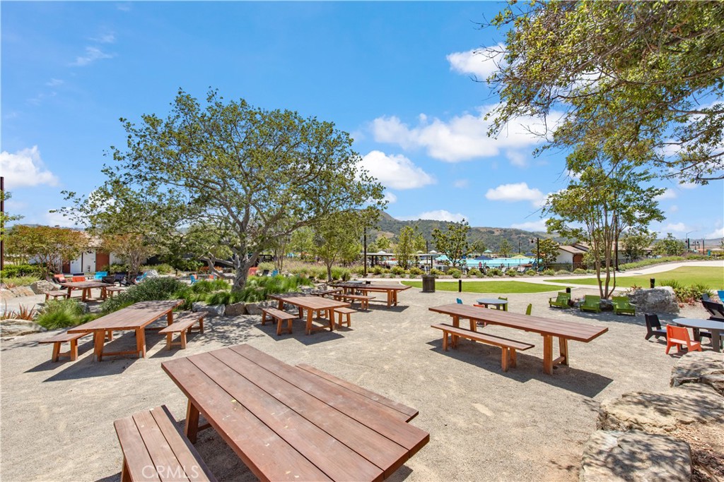 211 Ruby Road Rancho Mission Viejo, CA 92694 - Photo 37 of 41 a view of a swimming pool with lounge chairs