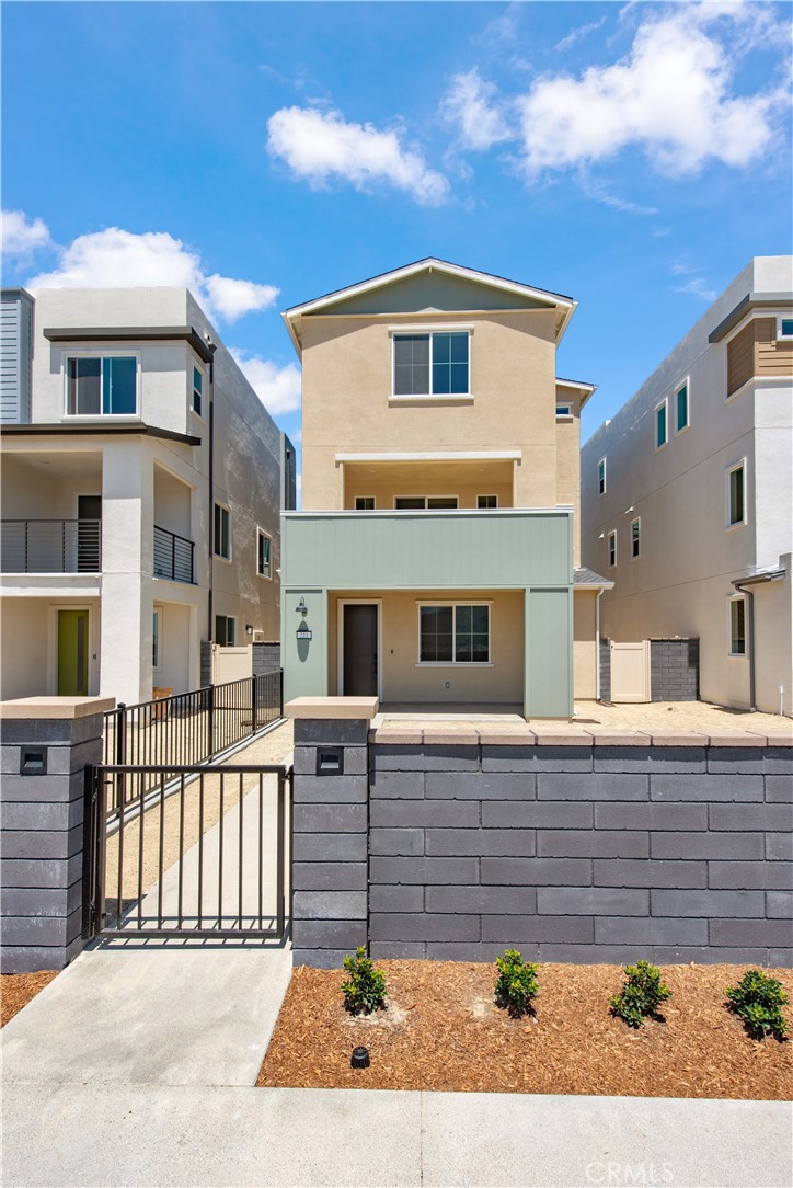 211 Ruby Road Rancho Mission Viejo, CA 92694 - Photo 5 of 41 a front view of a house with a fence