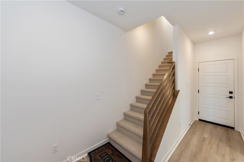 211 Ruby Road Rancho Mission Viejo, CA 92694 - Photo 10 of 41 a view of a hallway with staircase