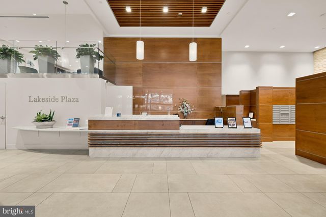 a spacious bathroom with a tub and sink