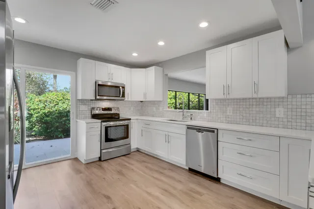 $700,000 | 13886 Whispering Lakes Lane, Palm Beach Gardens, FL 33418