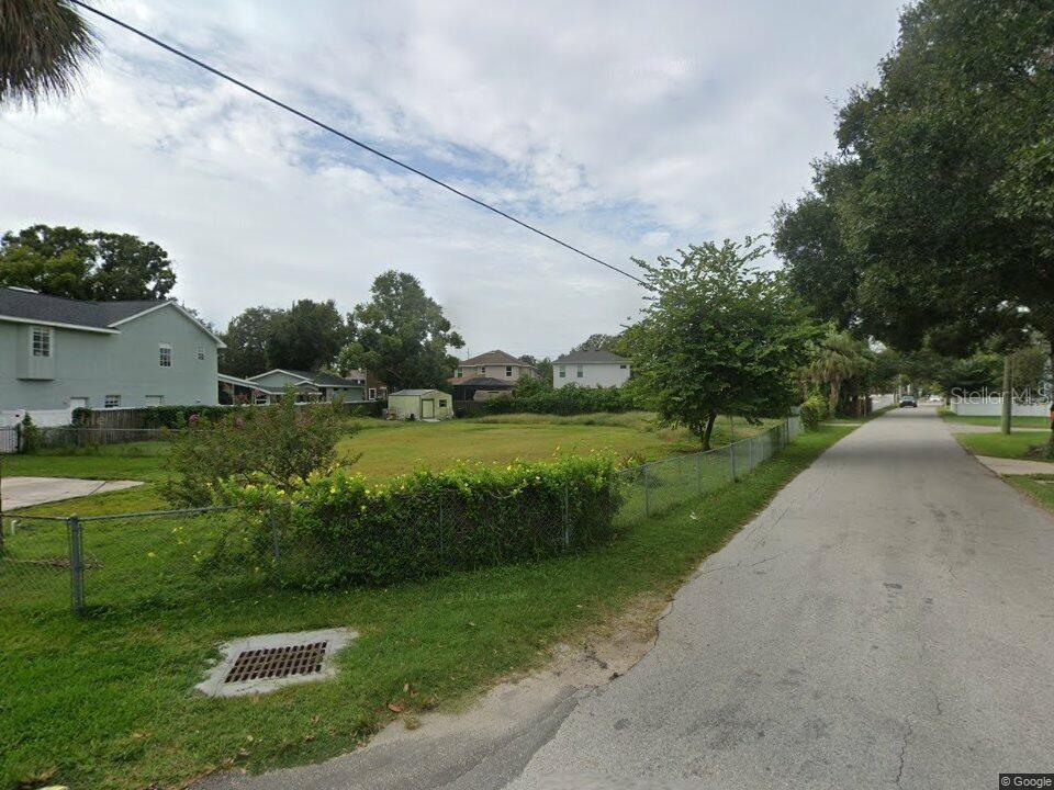5801 South 2nd Street Tampa, FL 33611 - Photo 3 of 13 a view of a garden with a lake