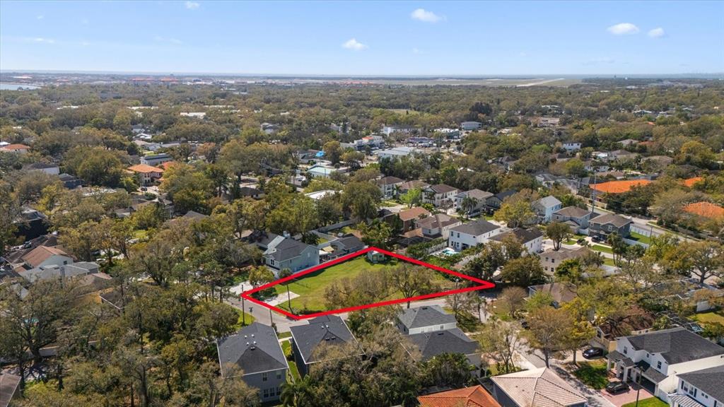 5801 South 2nd Street Tampa, FL 33611 - Photo 5 of 13 an aerial view of residential houses with outdoor space and trees