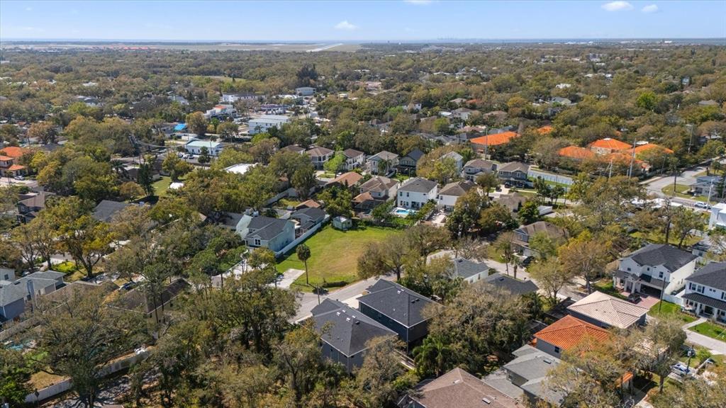 5801 South 2nd Street Tampa, FL 33611 - Photo 6 of 13 an aerial view of residential houses with outdoor space and trees