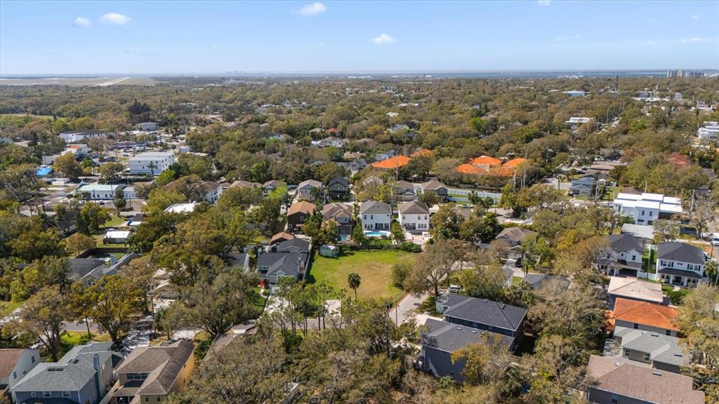 5801 South 2nd Street Tampa, FL 33611 - Photo 8 of 13 an aerial view of residential houses with outdoor space and trees