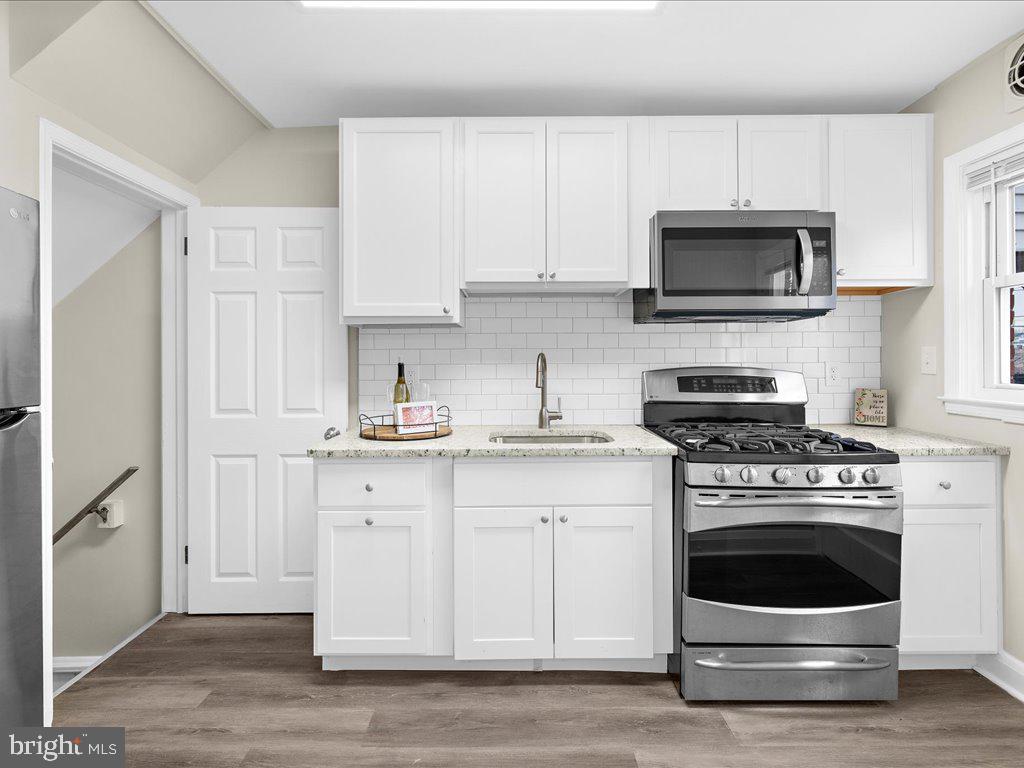 339 Dark Head Road Middle River, MD 21220 - Photo 8 of 42 Kitchen with granite counters and SS appliances