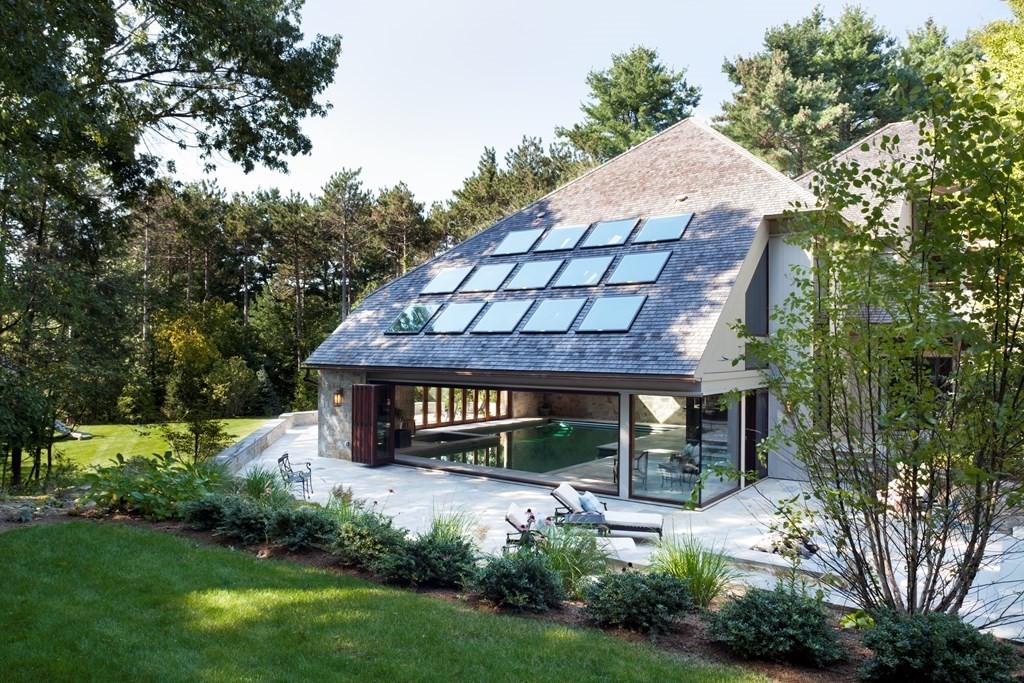 51 Scotch Pine Road Wellesley, MA 02481 - Photo 16 of 30 a front view of a house with garden