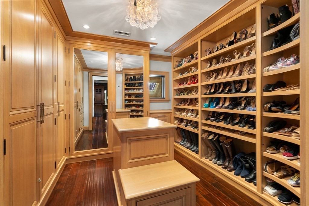 51 Scotch Pine Road Wellesley, MA 02481 - Photo 19 of 30 a view of walk in closet with clothes and shoes