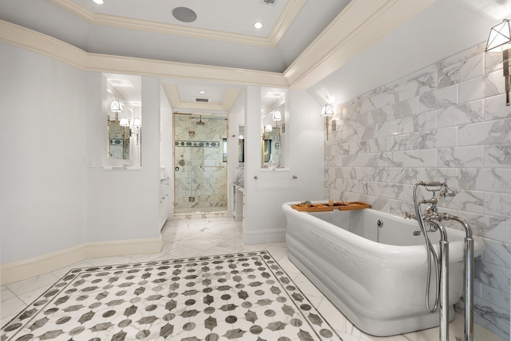 51 Scotch Pine Road Wellesley, MA 02481 - Photo 21 of 30 a bathroom with a bathtub a toilet a sink and shower