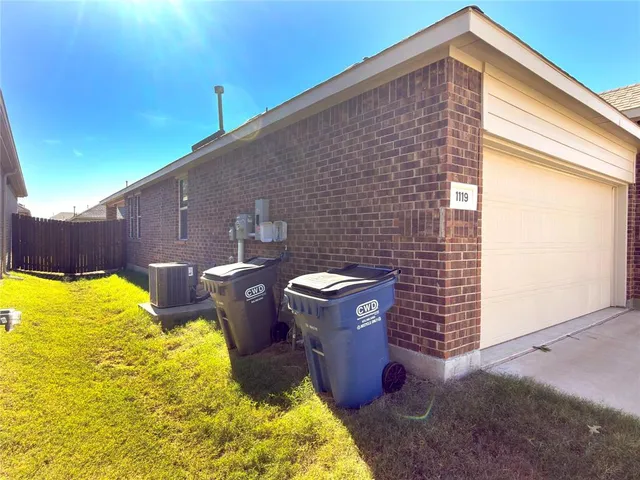 a view of a backyard with plants