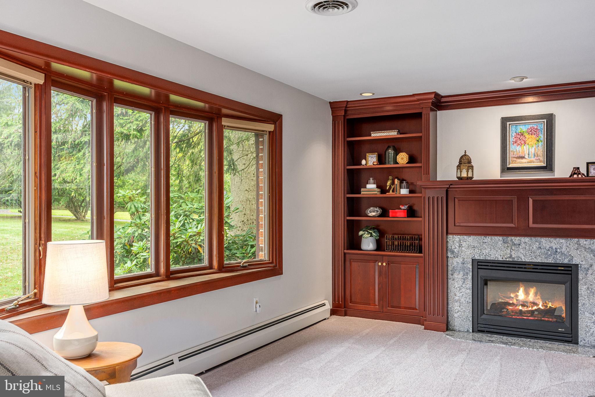 1995 Peppermint Road Coopersburg, PA 18036 - Photo 11 of 67 a living room with furniture a window and a fireplace
