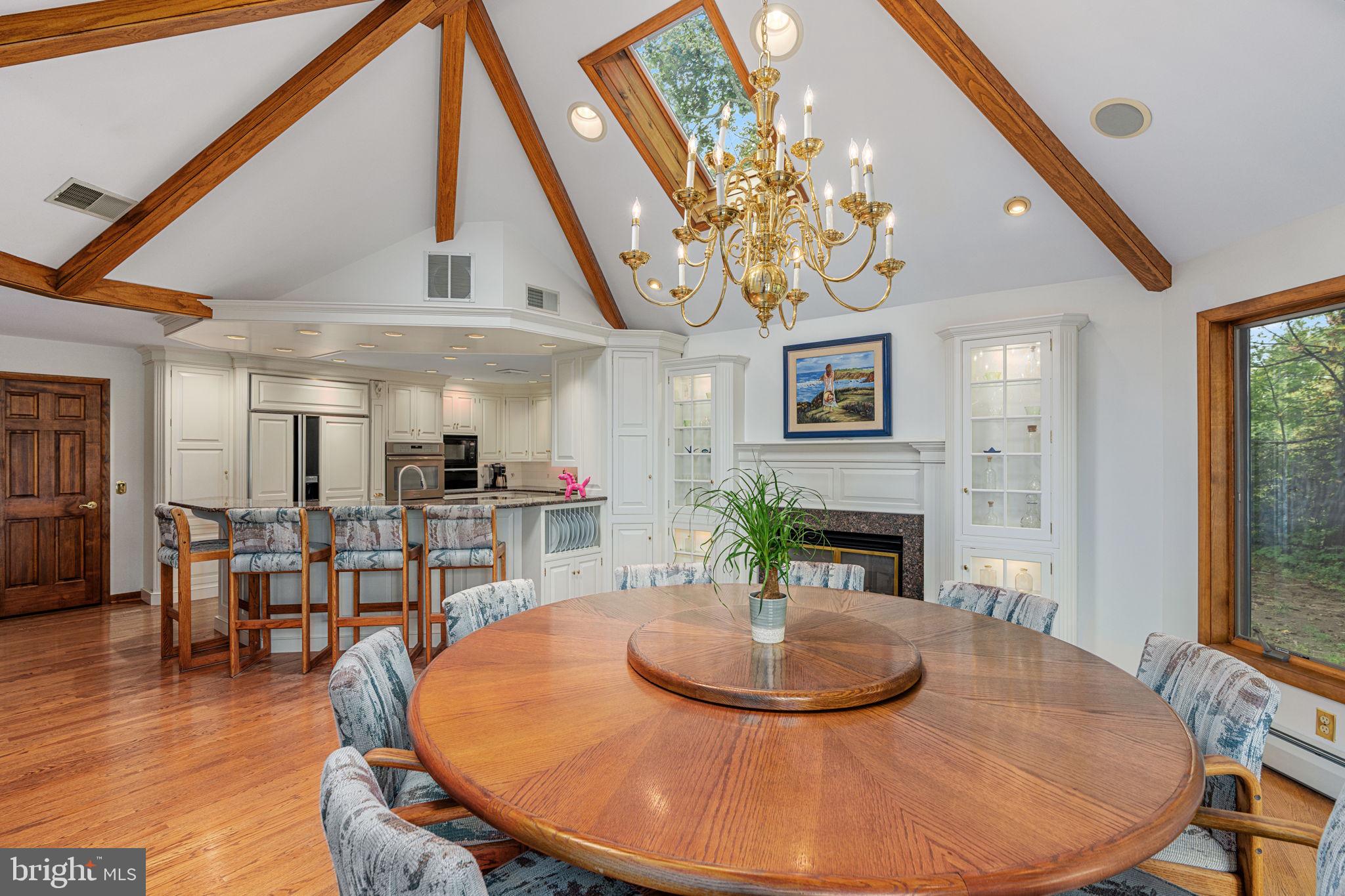 1995 Peppermint Road Coopersburg, PA 18036 - Photo 17 of 67 a room with fireplace and dining table