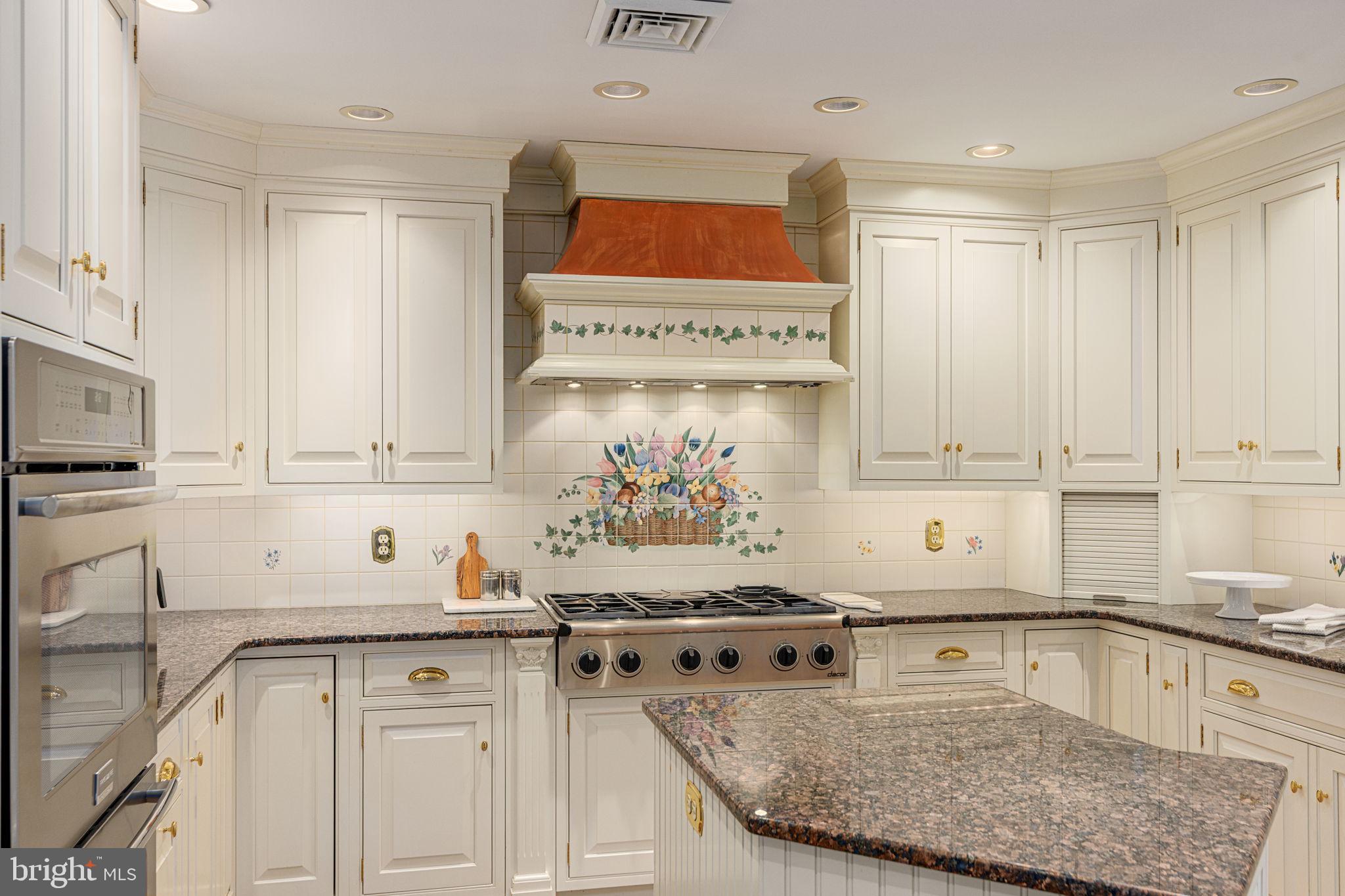 1995 Peppermint Road Coopersburg, PA 18036 - Photo 22 of 67 a kitchen with granite countertop a sink a stove and cabinets