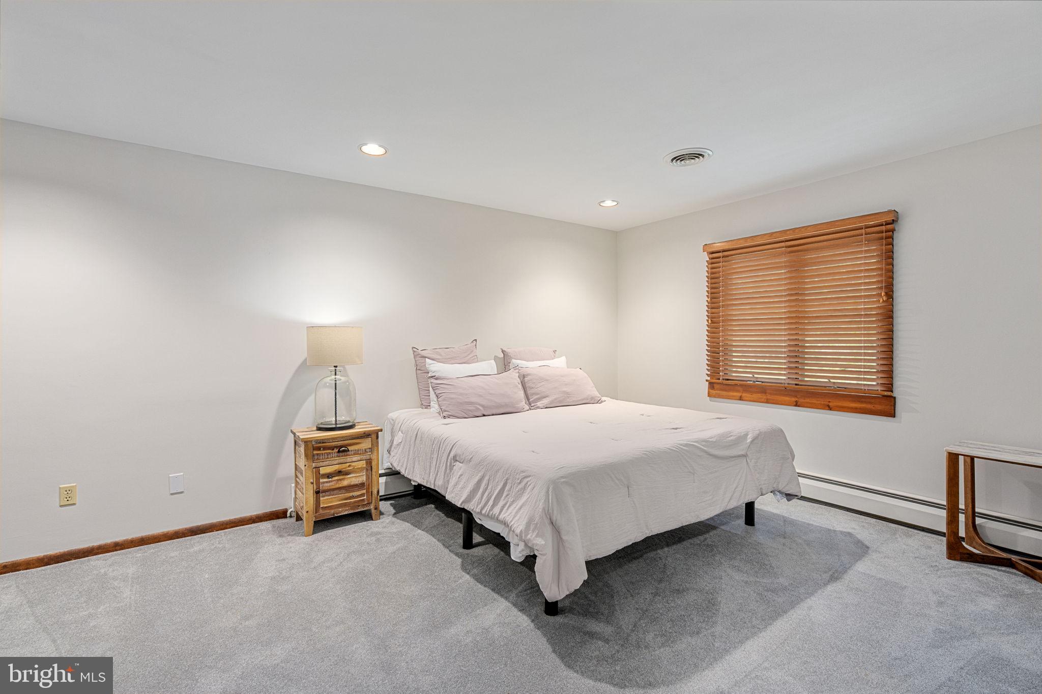 1995 Peppermint Road Coopersburg, PA 18036 - Photo 50 of 67 a bedroom with a bed and a window