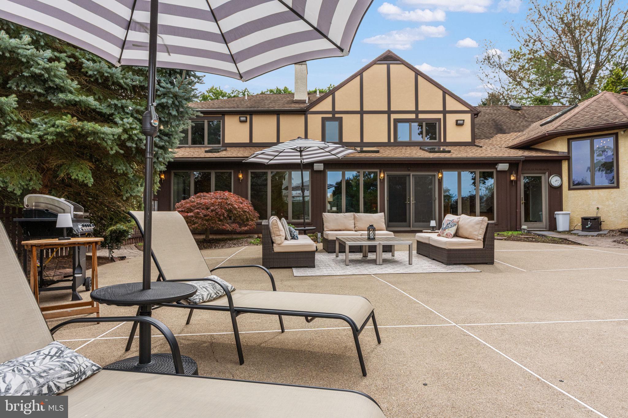 1995 Peppermint Road Coopersburg, PA 18036 - Photo 53 of 67 a view of a patio with couches table and chairs and potted plants