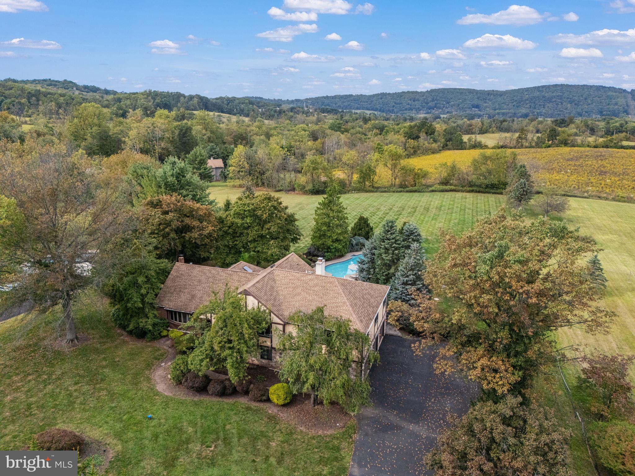 1995 Peppermint Road Coopersburg, PA 18036 - Photo 65 of 67 a view of a lake with a mountain in the background