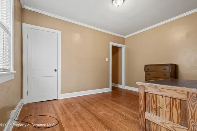 a view of a livingroom with wooden floor