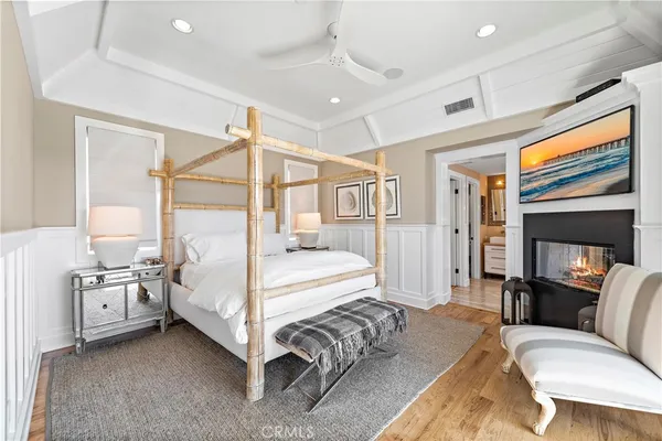 a bedroom with furniture and white walls
