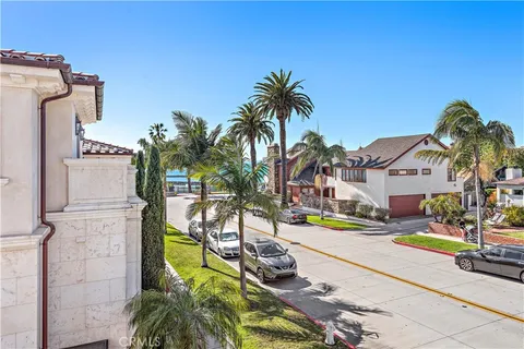 a view of a backyard with swimming pool