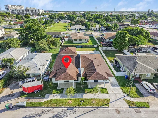 an aerial view of multiple house