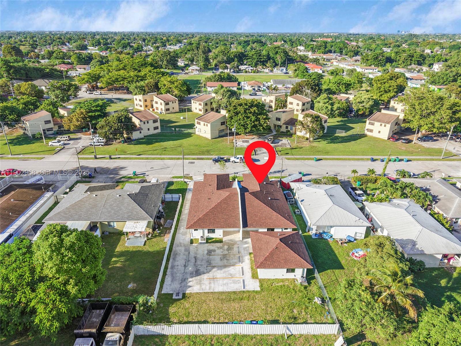 10362 Southwest 180th Street Miami, FL 33157 - Photo 16 of 18 an aerial view of a house with a garden
