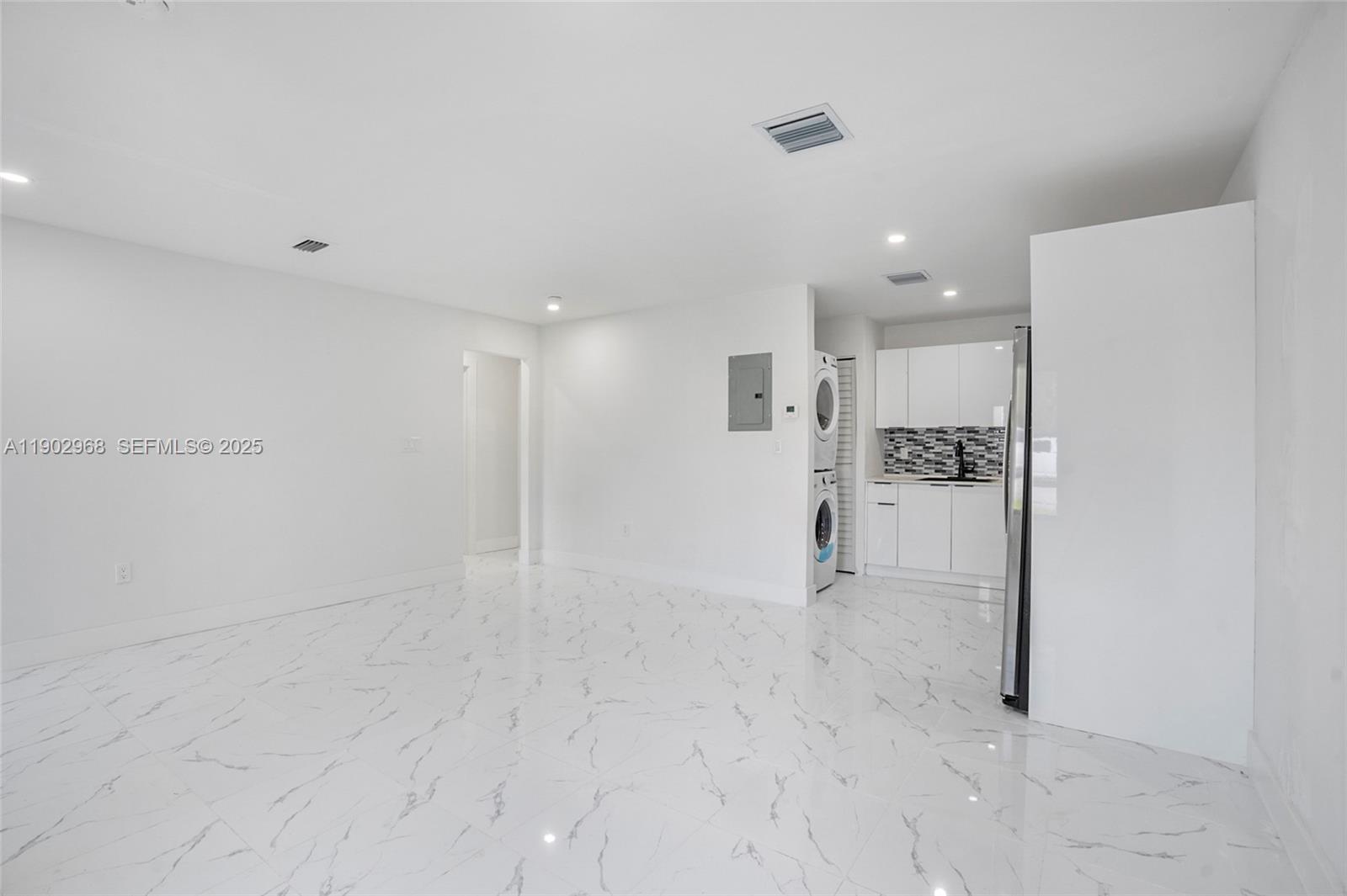 10362 Southwest 180th Street Miami, FL 33157 - Photo 5 of 18 a view of empty room