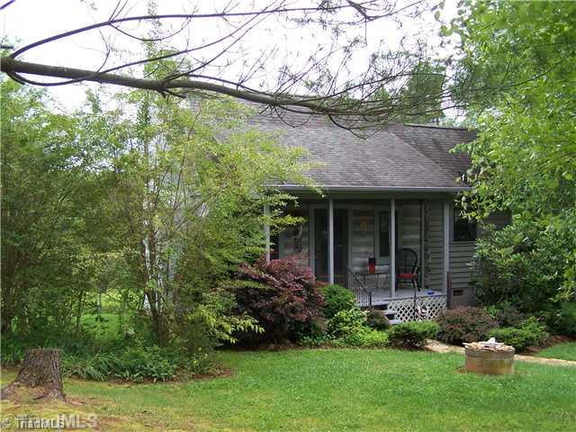 1409 Bud Tilley Road Pinnacle, NC 27043 - Photo 1 of 14 Exterior Front.