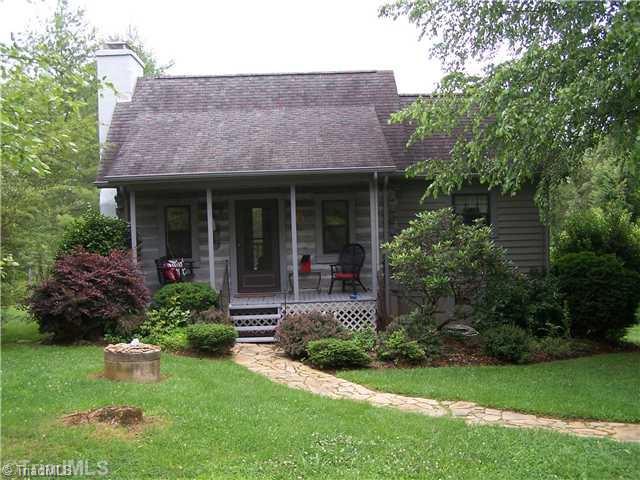 1409 Bud Tilley Road Pinnacle, NC 27043 - Photo 2 of 14 Exterior Front.