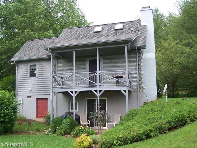 1409 Bud Tilley Road Pinnacle, NC 27043 - Photo 3 of 14 Exterior Back.