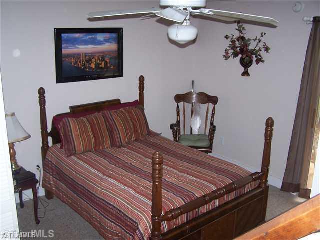 1409 Bud Tilley Road Pinnacle, NC 27043 - Photo 8 of 14 Master Bedroom.