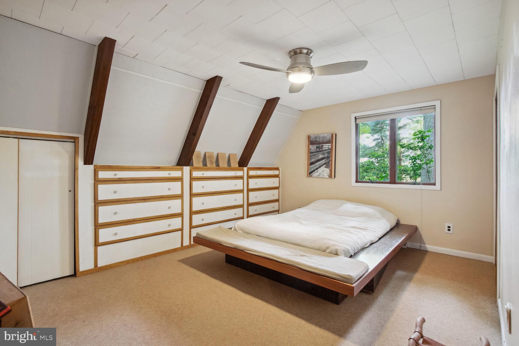315 Ellisdale Road Chesterfield, NJ 08515 - Photo 17 of 45 a bedroom with a bed and a window