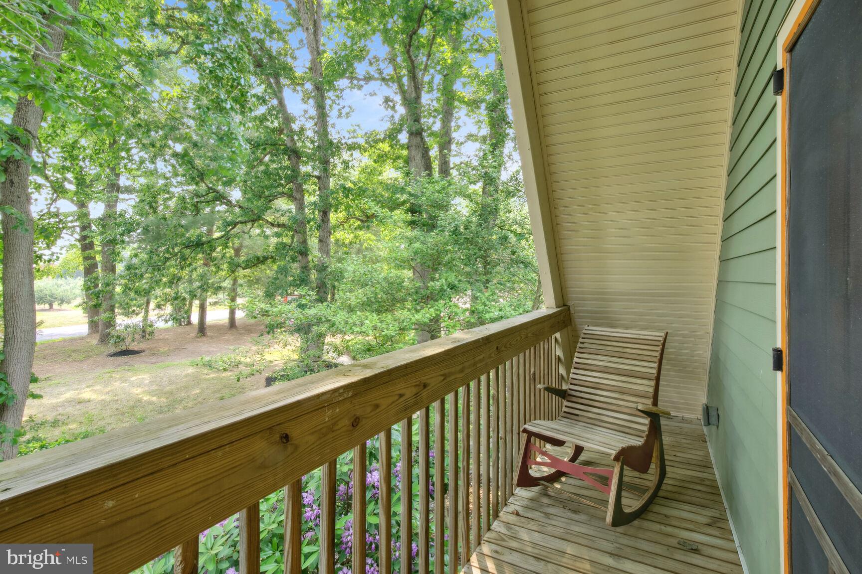 315 Ellisdale Road Chesterfield, NJ 08515 - Photo 29 of 45 a view of a two chair and table in the balcony