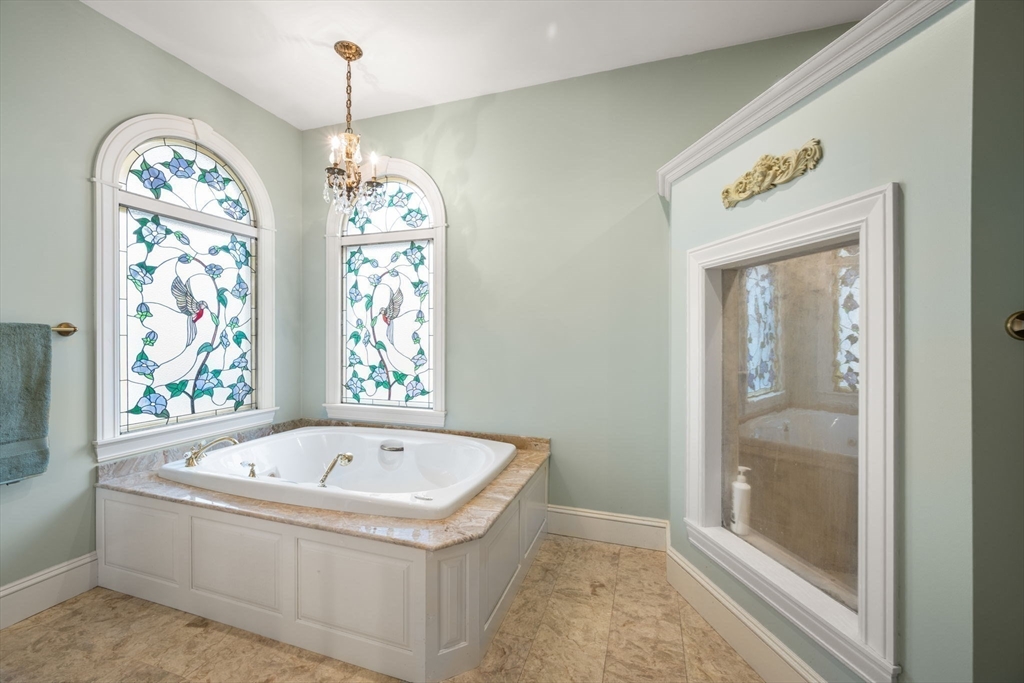 332 Division Road Dartmouth, MA 02748 - Photo 15 of 42 a white bath tub sitting next to a blue sink