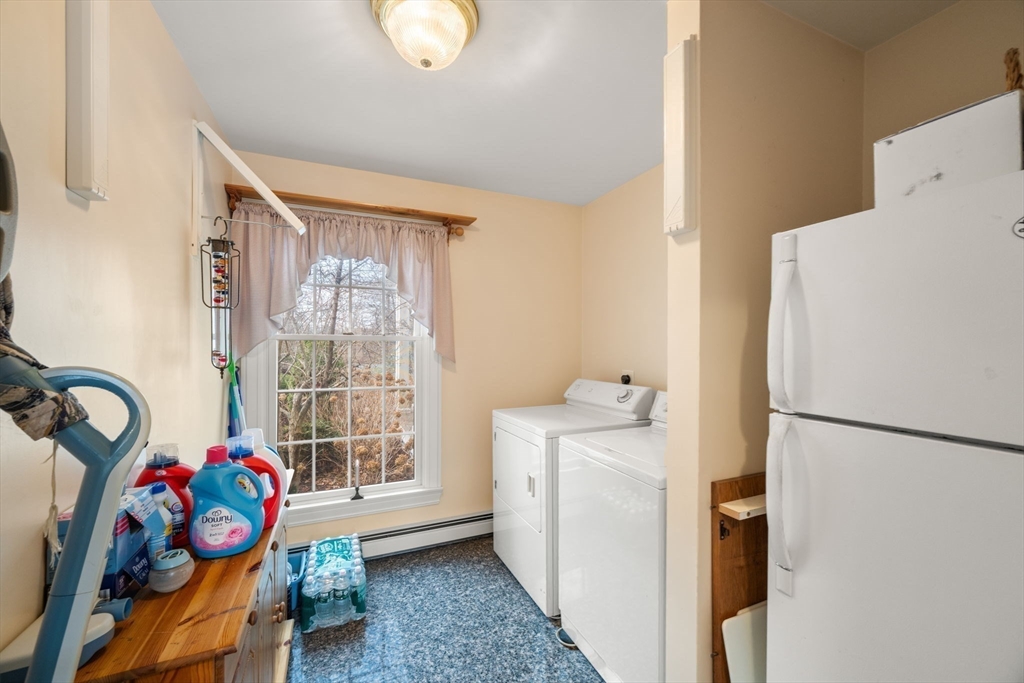 332 Division Road Dartmouth, MA 02748 - Photo 18 of 42 a bedroom with a bed and a window