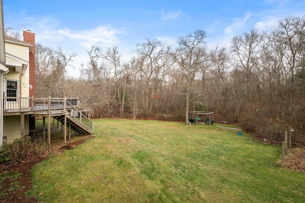 332 Division Road Dartmouth, MA 02748 - Photo 34 of 42 a view of a swimming pool with a patio