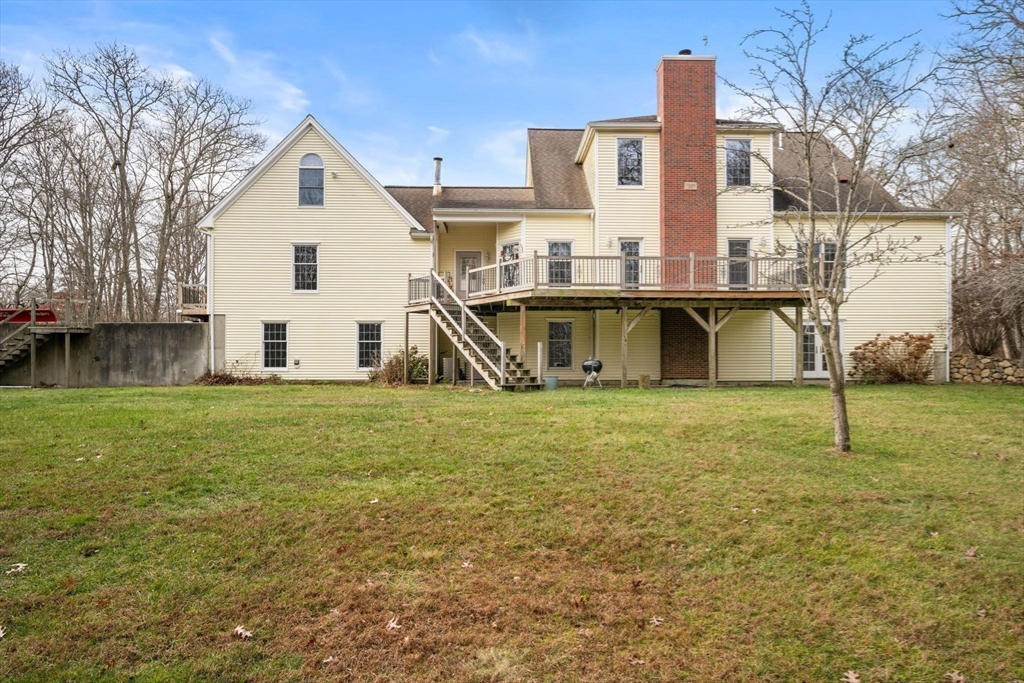 332 Division Road Dartmouth, MA 02748 - Photo 36 of 42 a view of a house with a yard