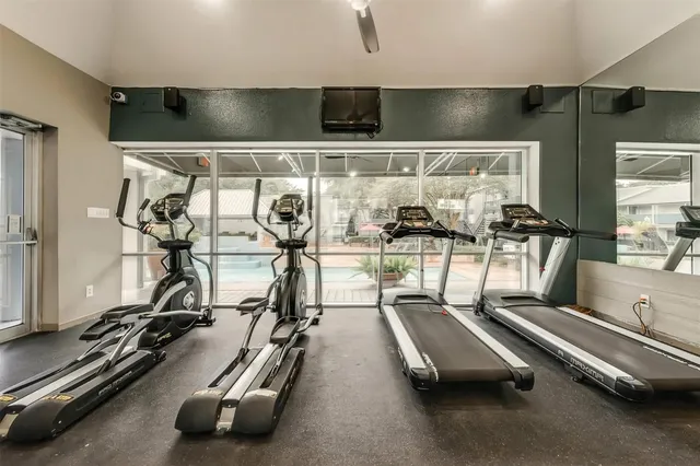 a view of a room with gym equipment