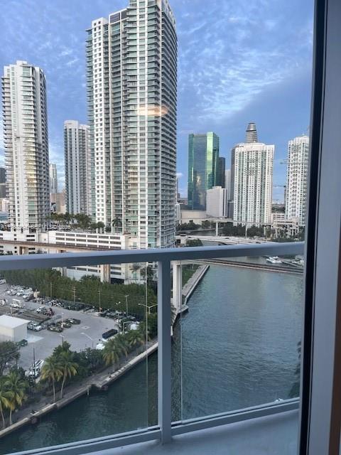 185 Southwest 7th Street, Unit 1605 Miami, FL 33130 - Photo 1 of 22 a balcony with view of lake view