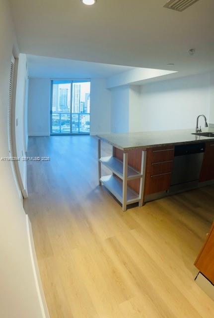 185 Southwest 7th Street, Unit 1605 Miami, FL 33130 - Photo 11 of 22 a view of an empty room with a window
