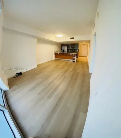 a view of kitchen and microwave