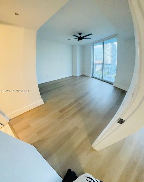 185 Southwest 7th Street, Unit 1605 Miami, FL 33130 - Photo 15 of 22 a view of livingroom with window